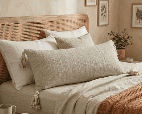 Beige extra long lumbar pillow cover with tassels, textured neutral boho accent cushion for bed and sofa decor