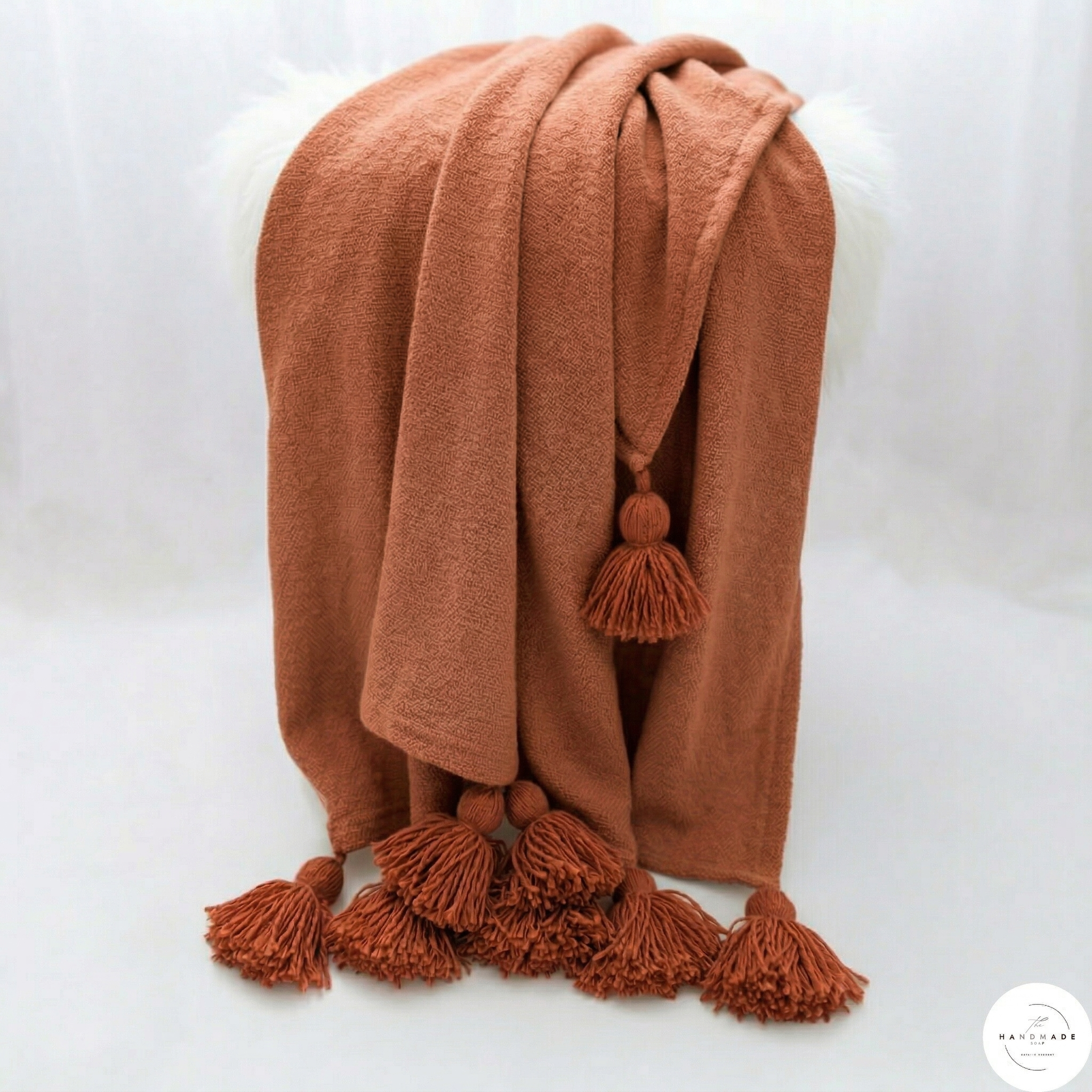 Moroccan throw blanket, hand-loomed cotton throw, oversized pom pom blanket, terracotta home decor, artisan made textiles, Marrakech weaving, heavy weight cotton blanket.