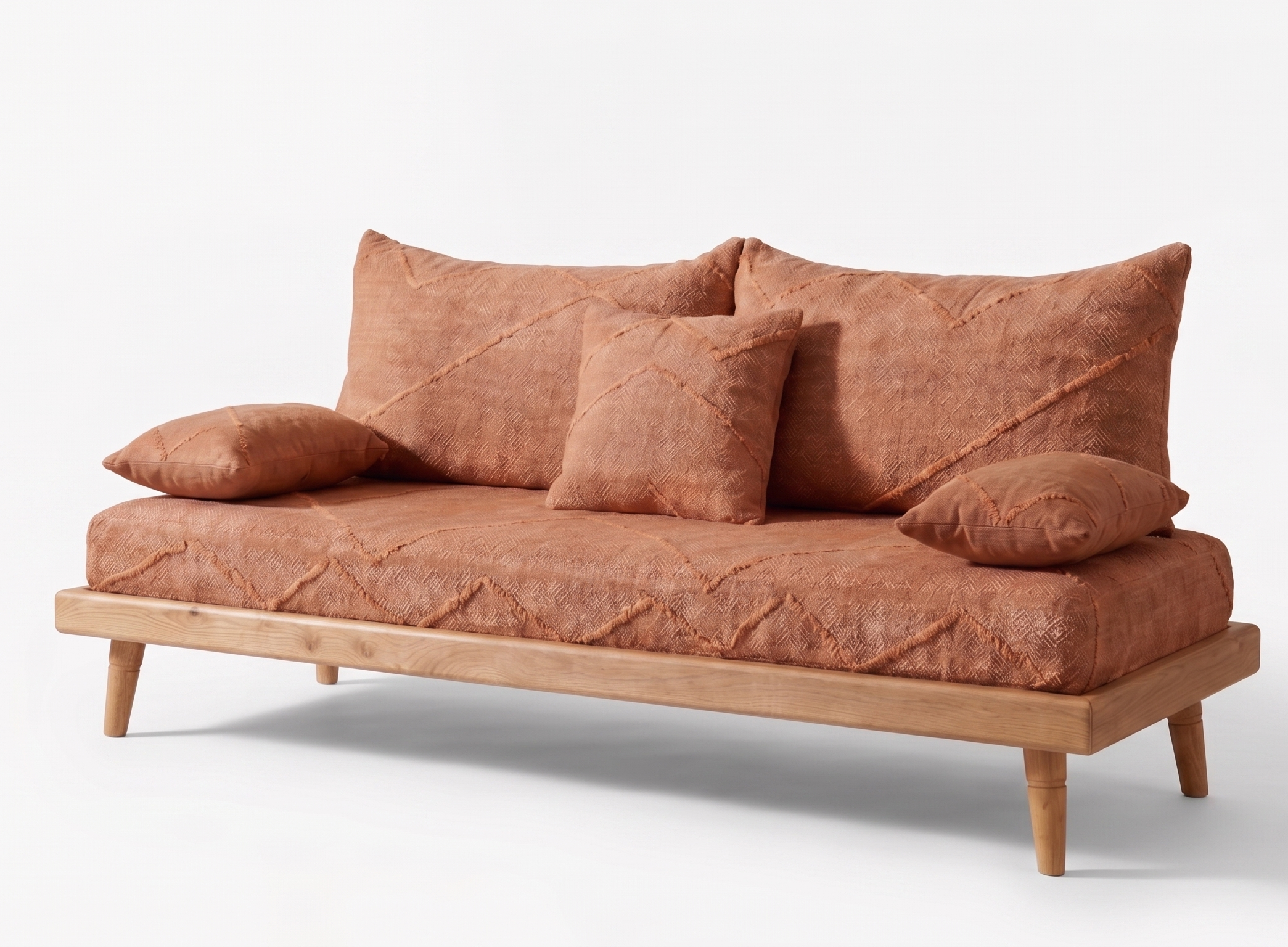 Handcrafted Moroccan low-profile sofa set with terracotta cotton cushions and natural wood frames in a warm, modern living room.