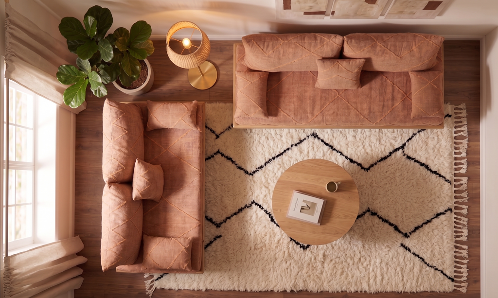 Handcrafted Moroccan low-profile sofa set with terracotta cotton cushions and natural wood frames in a warm, modern living room.